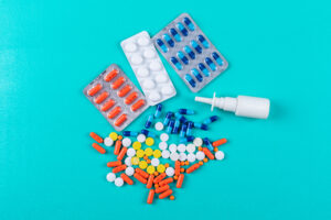 Multiple prescription medications and pill bottles illustrating the risks of polypharmacy and medication safety in Nigeria.
